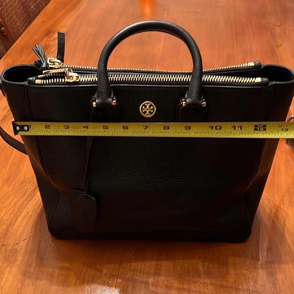 Tory Burch bag used like once.  Comes without charm.